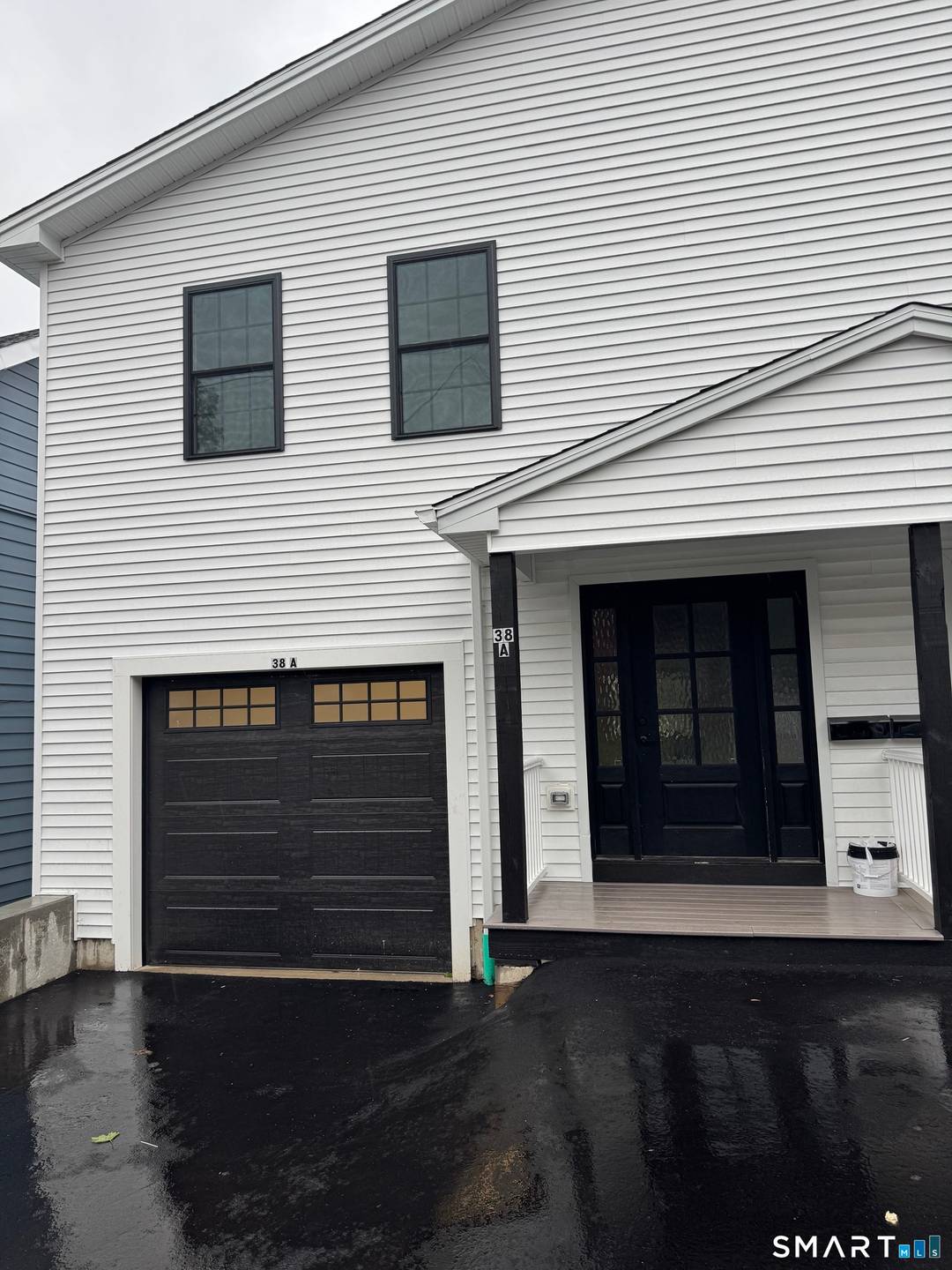 Experience modern living in this nearly new duplex in desirable Milford.