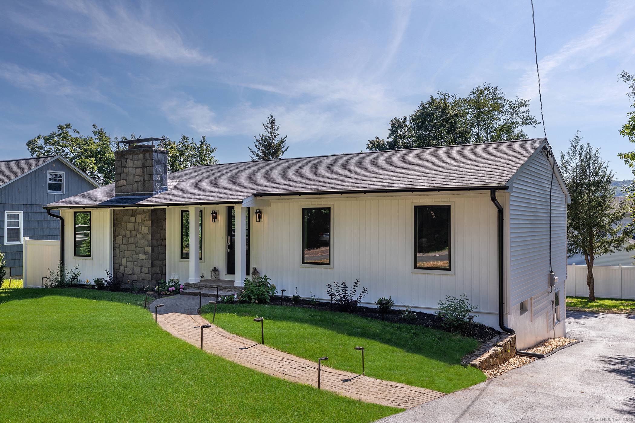 Discover the ease of main level loving, in this stunningly renovated Candlewood Shores Ranch with finished walk out lower level, large fenced yard, level property, lake views and a short ...
