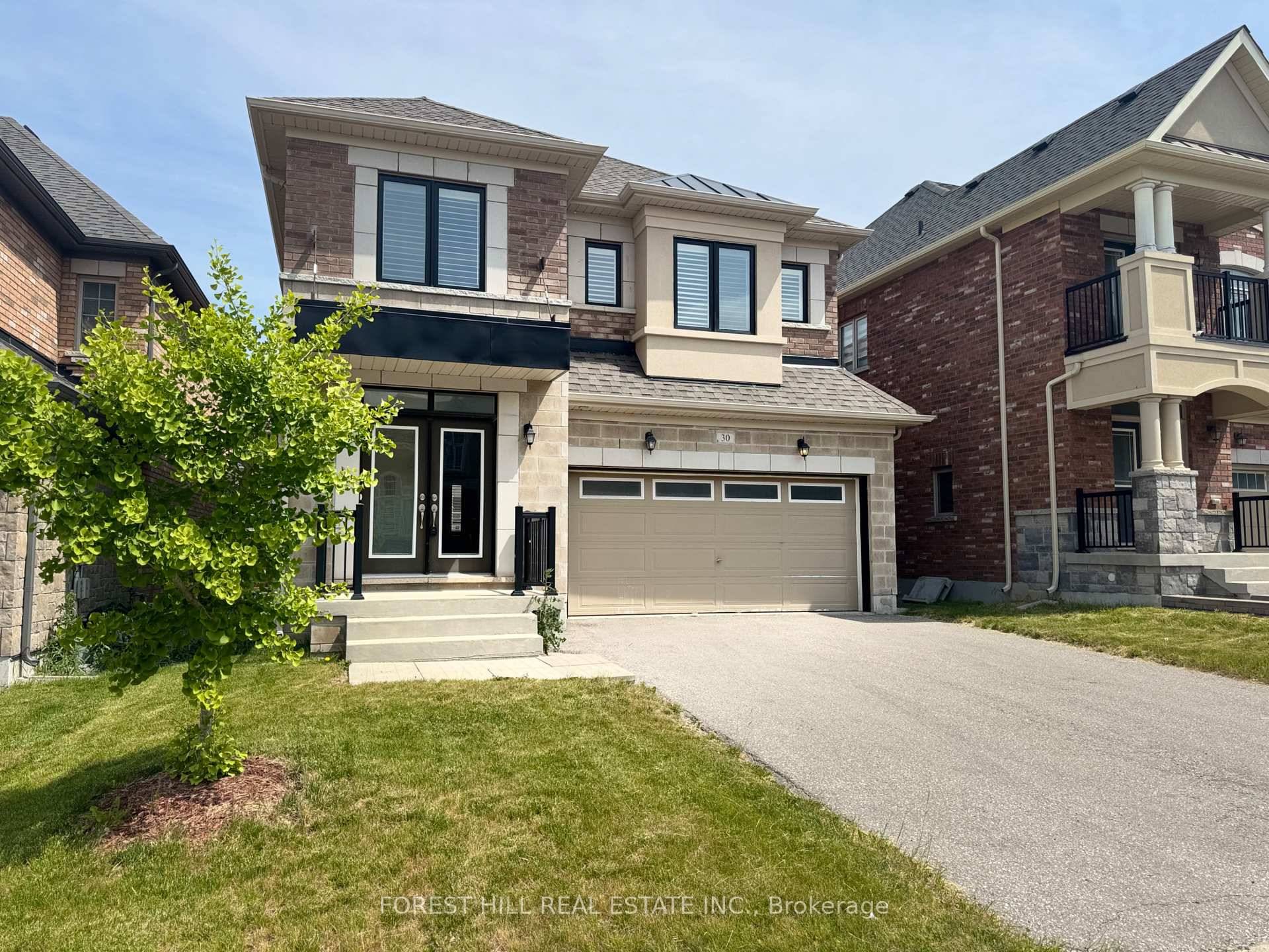 Welcome to 30 William Luck Ave, a beautifully designed home in the heart of East Gwillimbury.