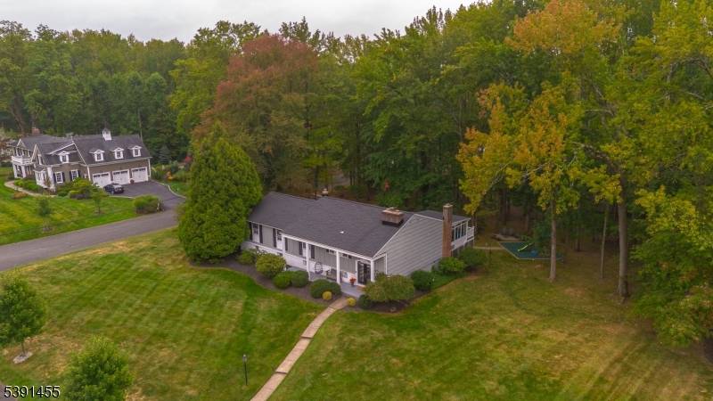 Welcome to this stunning raised ranch situated on just under an acre in a picturesque double cul de sac neighborhood.