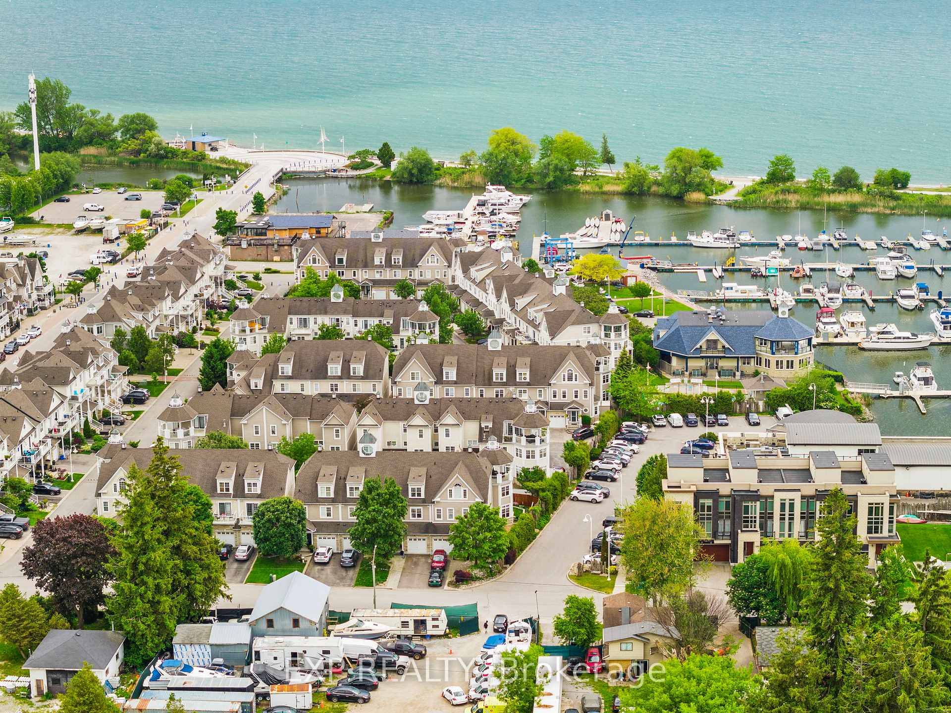 Wake up to the shimmer of lake views and end your days with breathtaking sunsets in this executive 3 bedroom freehold townhome, perfectly nestled in Pickering's sought after Nautical Village.
