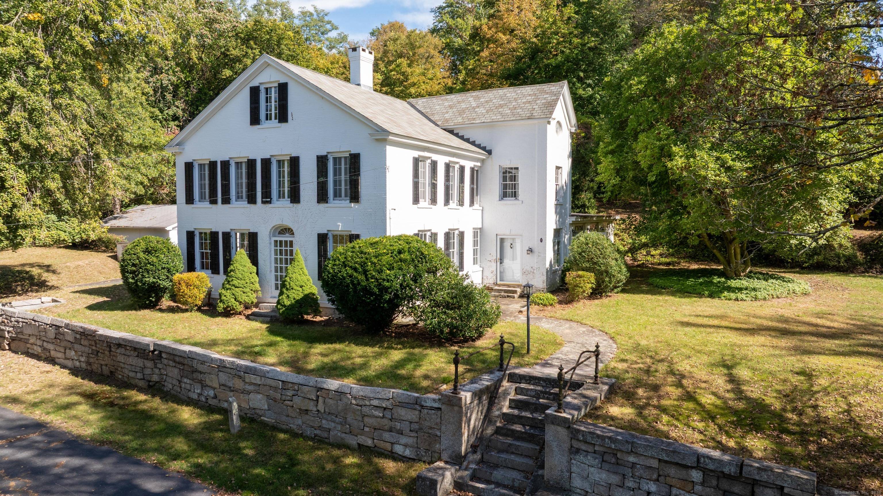 Step back in time with this stately 1829 Federal style residence, known as the Charles L.