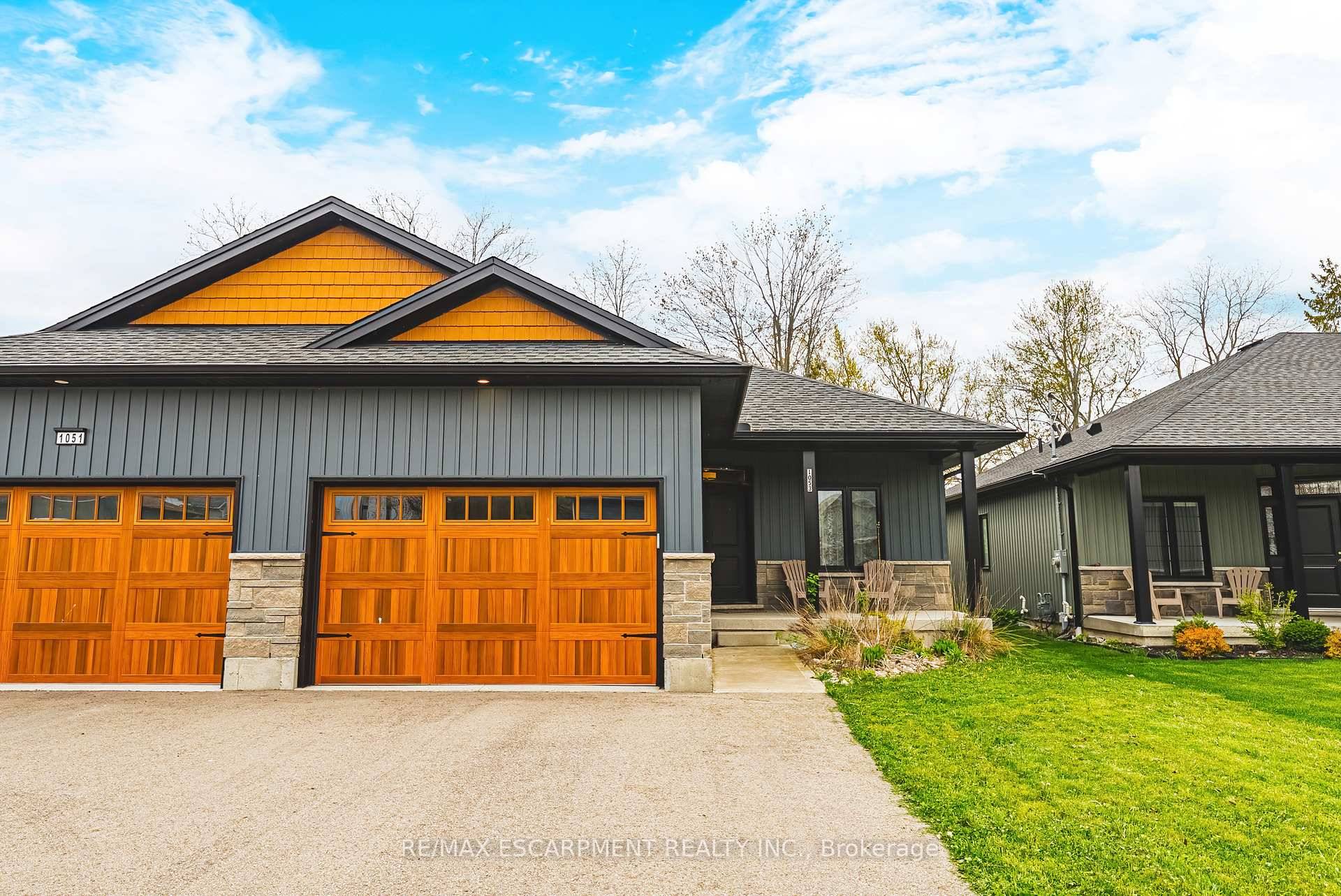 Welcome to 1053 Bay Street A Modern Lakeside Retreat in Port Rowan Nestled in the charming lakeside community of Port Rowan, this beautifully built semi detached bungalow offers a seamless ...