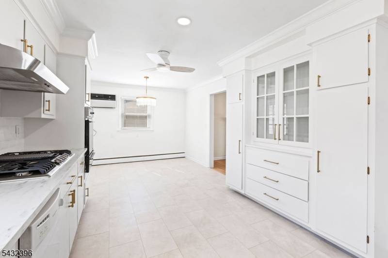 Charming and beautifully refreshed Cape Cod in a desirable Springfield neighborhood !