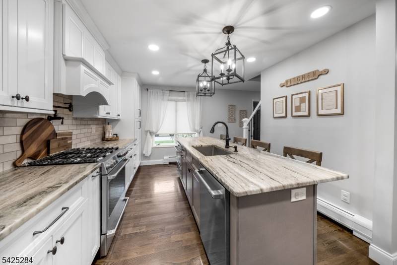 Beautifully updated, Move in Ready Cape Cod features three bedrooms and two full baths.