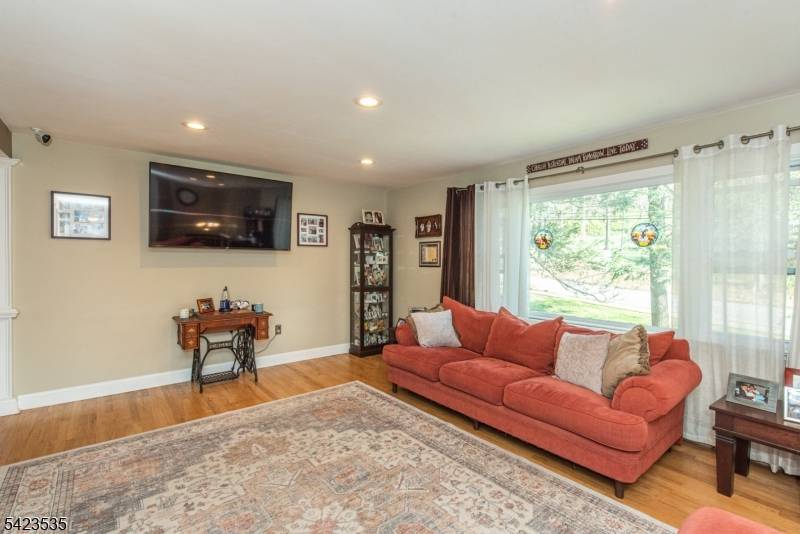Welcome home to this beautifully maintained bi level in the highly sought after Center Grove Elementary section of Randolph.