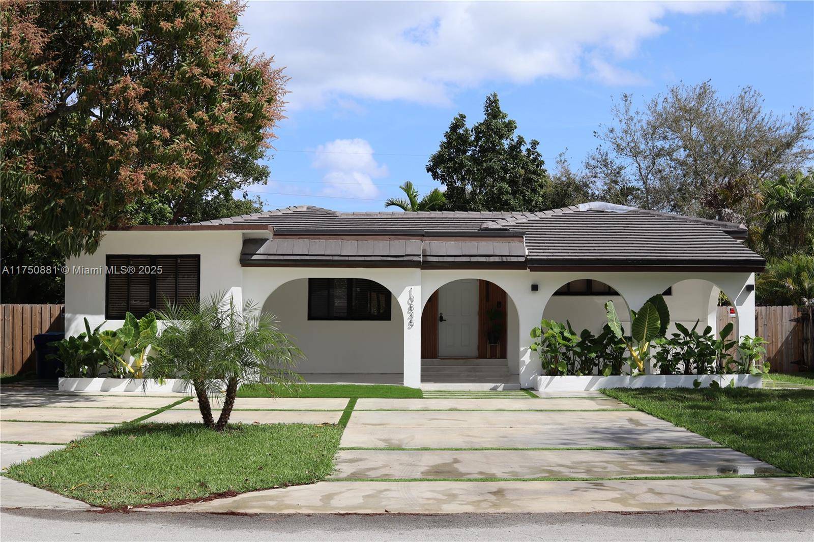 Discover this stunning residence in the desirable Village of Biscayne Park.