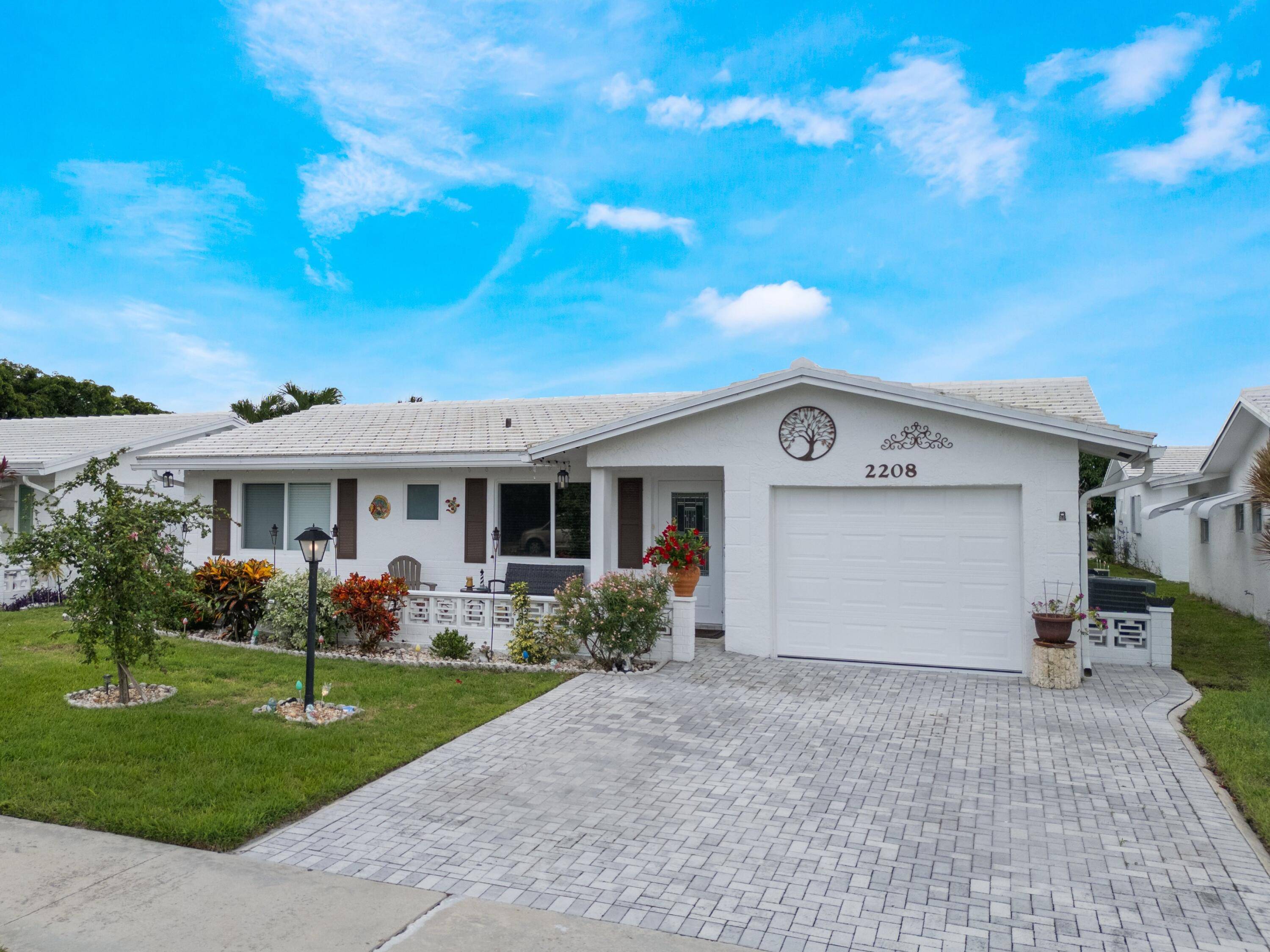 Live your Best Life in this exquisite retreat in Boynton Beach Leisureville, the coveted 55 community where every day feels like a vacation.