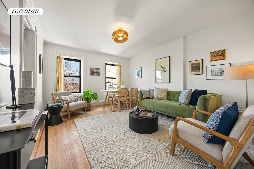 Welcome home to a bright and sunny two bed, one bath floor through Brownstone co op in prime Park Slope !