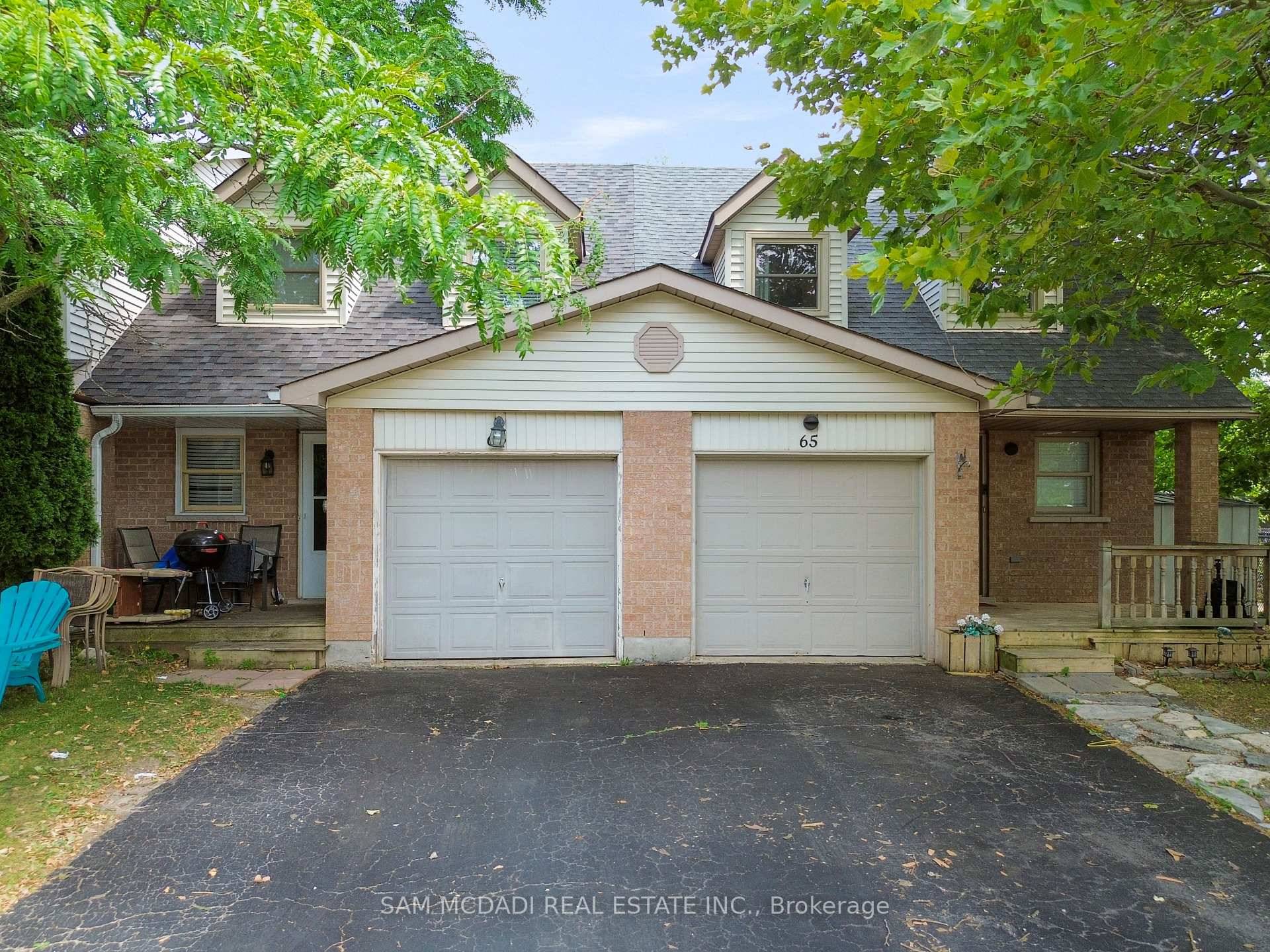 Welcome to this inviting end unit townhome on a spacious corner lot in one of Cambridge's most peaceful pockets.