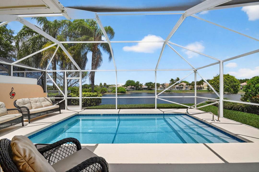 Escape the winter and enjoy the South Florida lifestyle in this beautifully appointed villa offering stunning preserve and expansive lake views in the highly sought after VillageWalk of Wellington community.