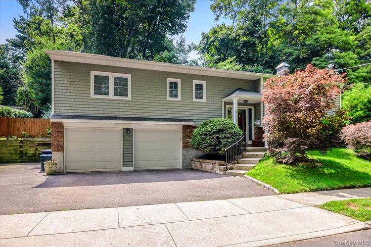 Move right into this beautifully updated 4 bedroom, 3 full bath home located less than a half mile from Huntington Village offering spacious living areas and modern updates, that combine ...
