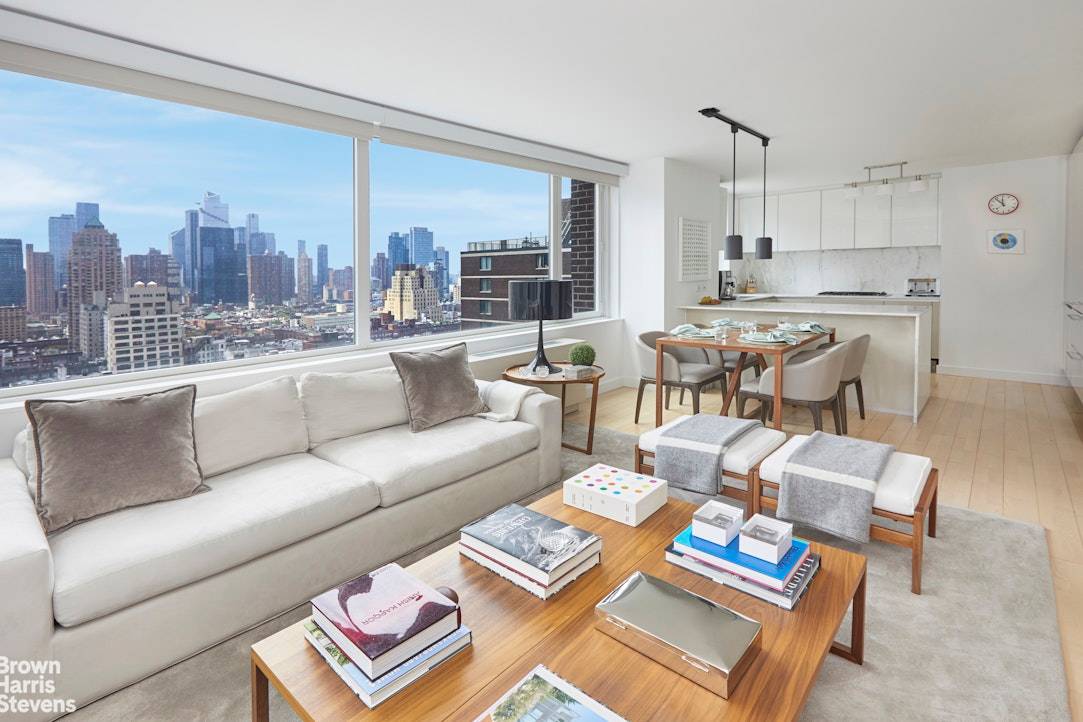 This corner sunny and cheerful 3 bedroom and 2 bath residence in the Columbus Circle neighborhood features a large living room with sweeping Midtown city view towards South and East.