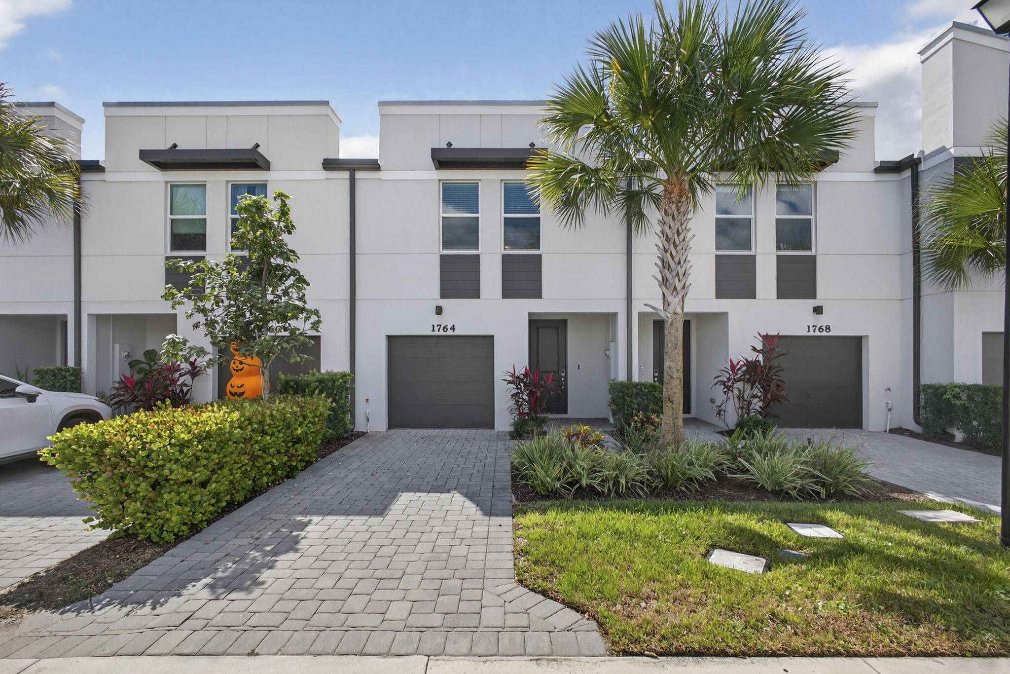 Welcome to the Enclave at Mangonia Park a stunning modern townhome offering stylish design and exceptional convenience in a gated community.