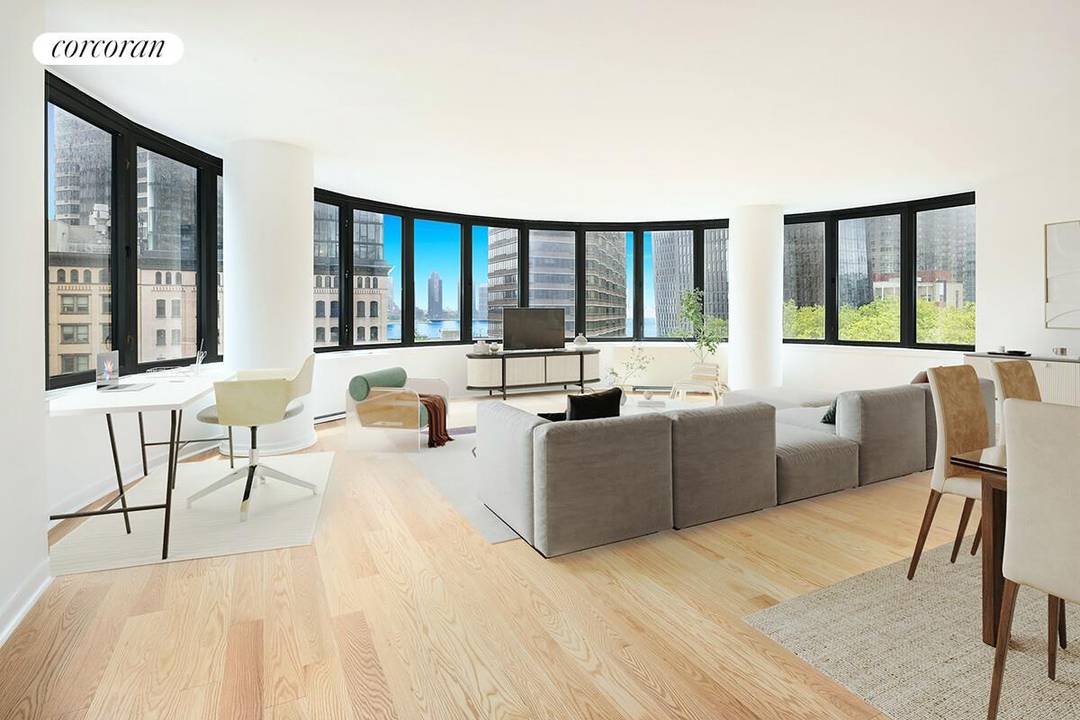 Grand three bedroom, three bathroom with semi circular living space highlighted by15 rounded bay windows framing the East River and Southern city views in a luxurious, amenity driven condominium.