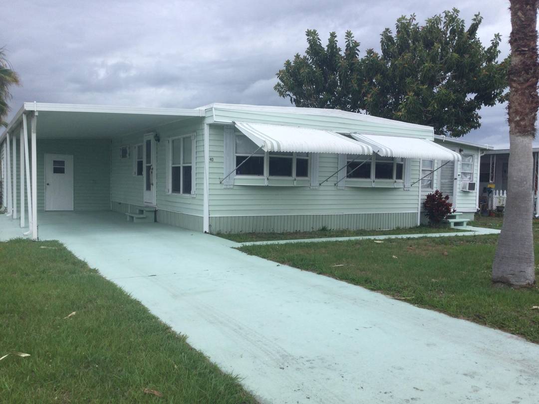 Seller financing available on this recently refurbished home in the 55 plus community of Spanish Lakes.