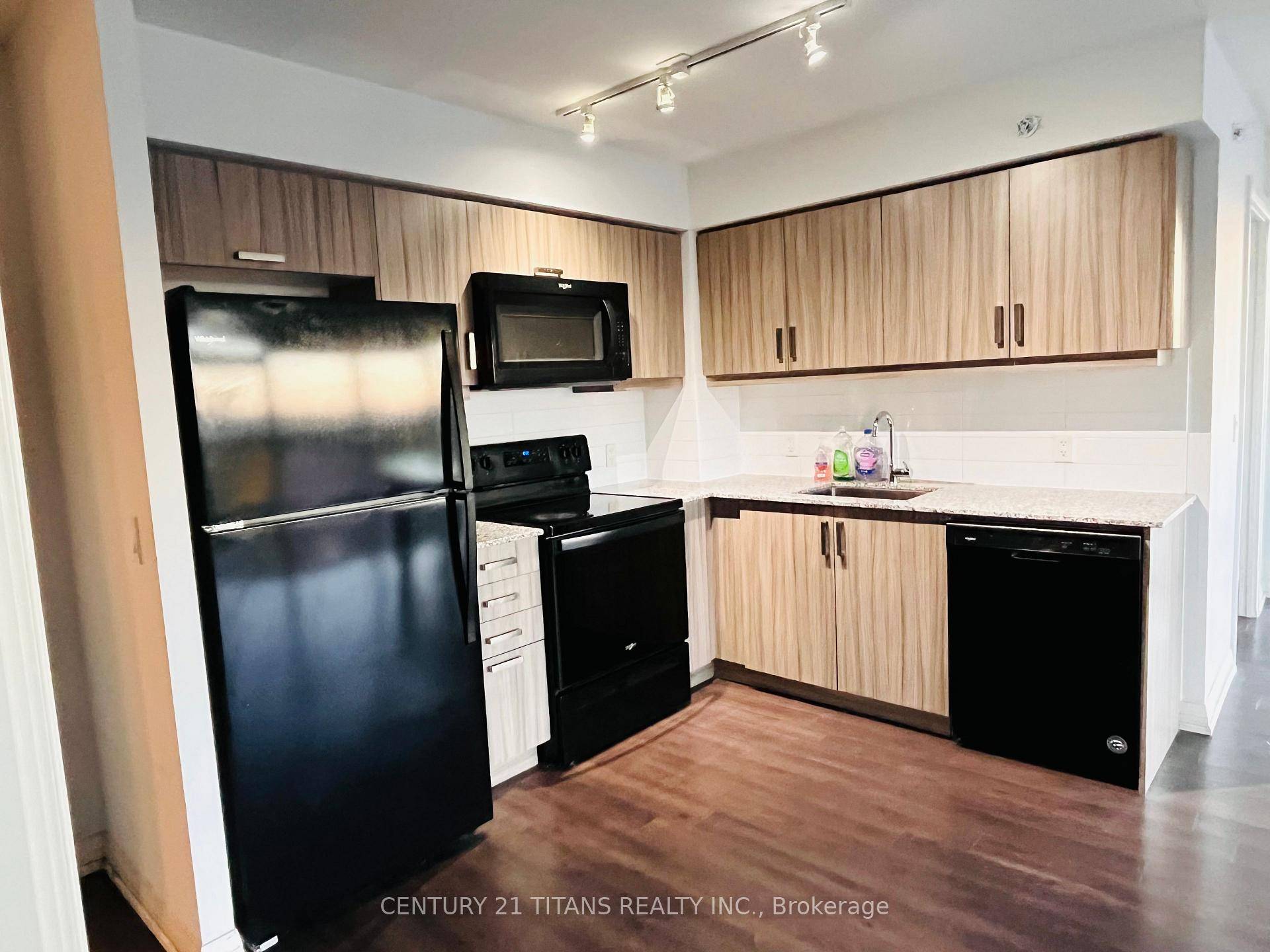 Corner Unit 2 Bedrooms plus Den !