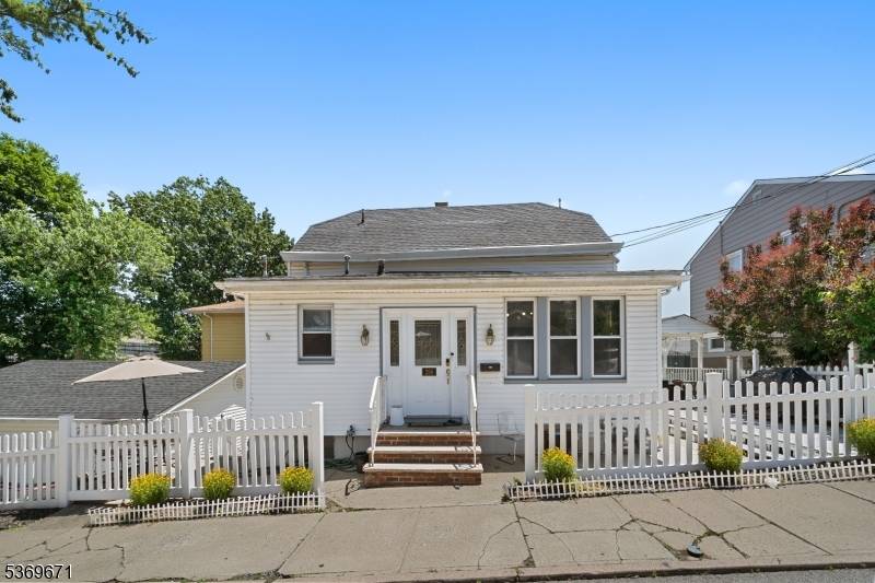 Welcome to this charming and versatile two family home located in the heart of Prospect Park, NJ.