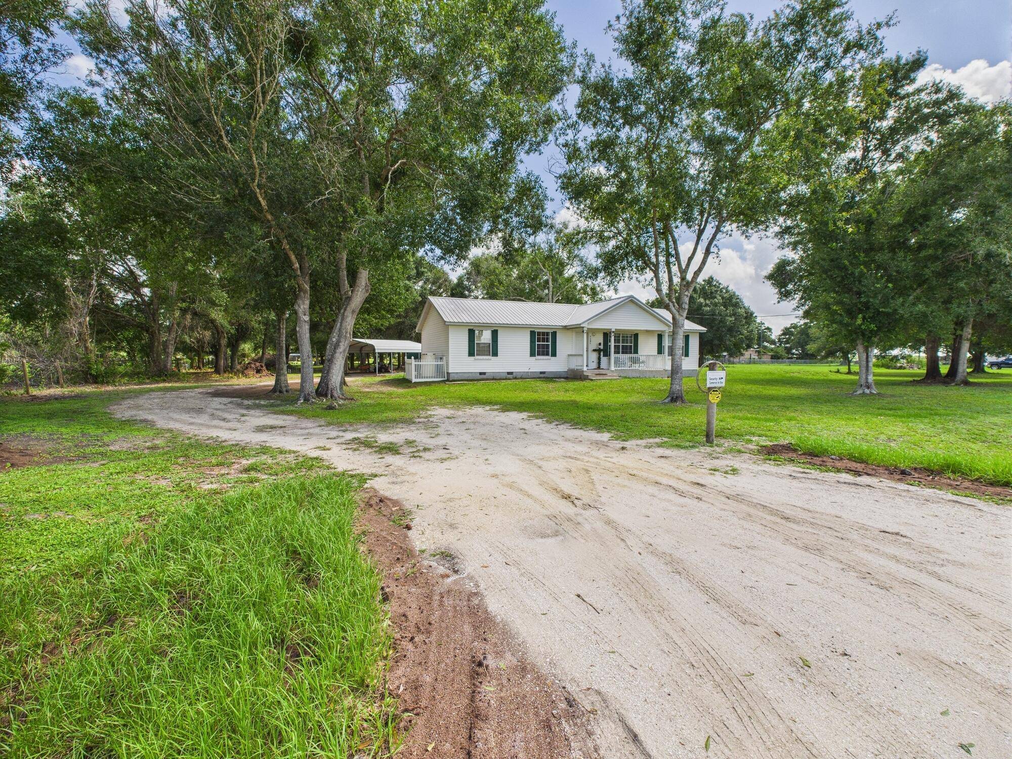 Charming 4BD 2BA home on a beautiful oak covered acre, offering plenty of shade and privacy with trees responsibly maintained away from the house.