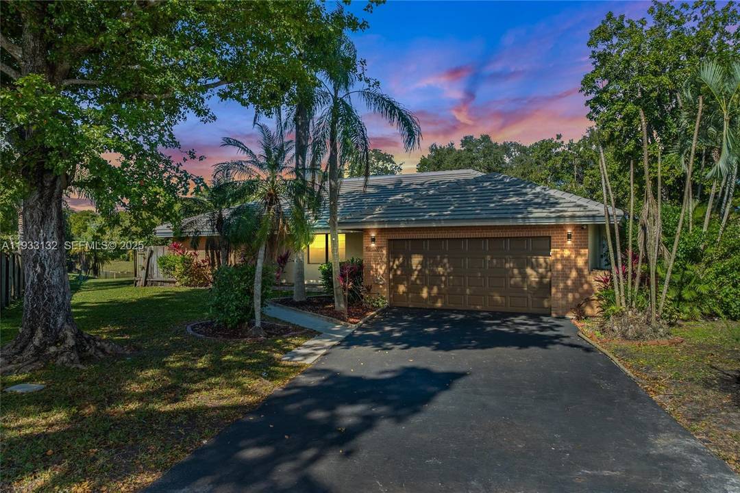 Welcome to this beautifully renovated pool home, ideally situated on a quiet cul de sac in a desirable Coral Springs neighborhood.