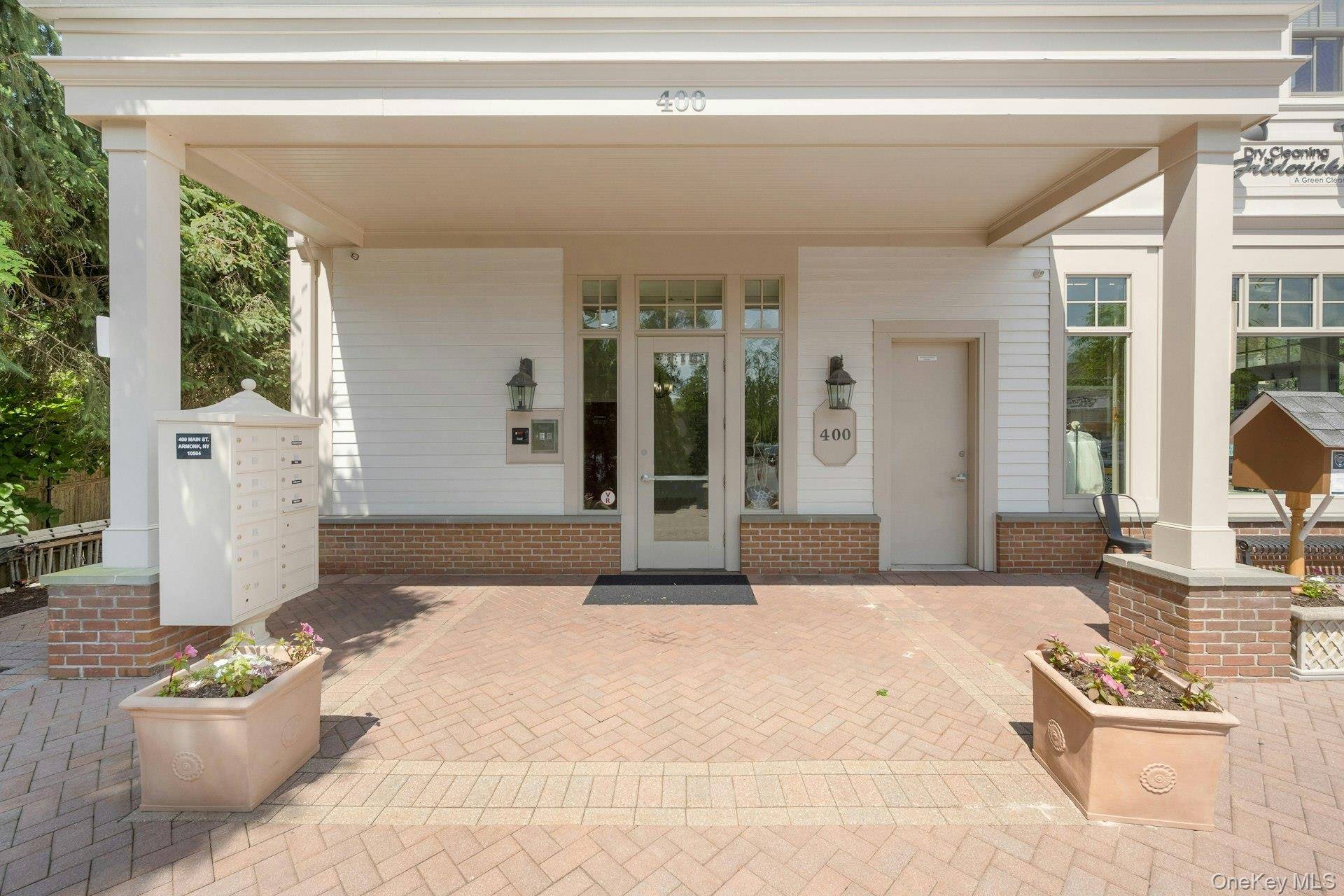 Experience the undeniable charm of 400 Main Street, Armonk NY, a rare gem nestled in the heart of Armonk Square.