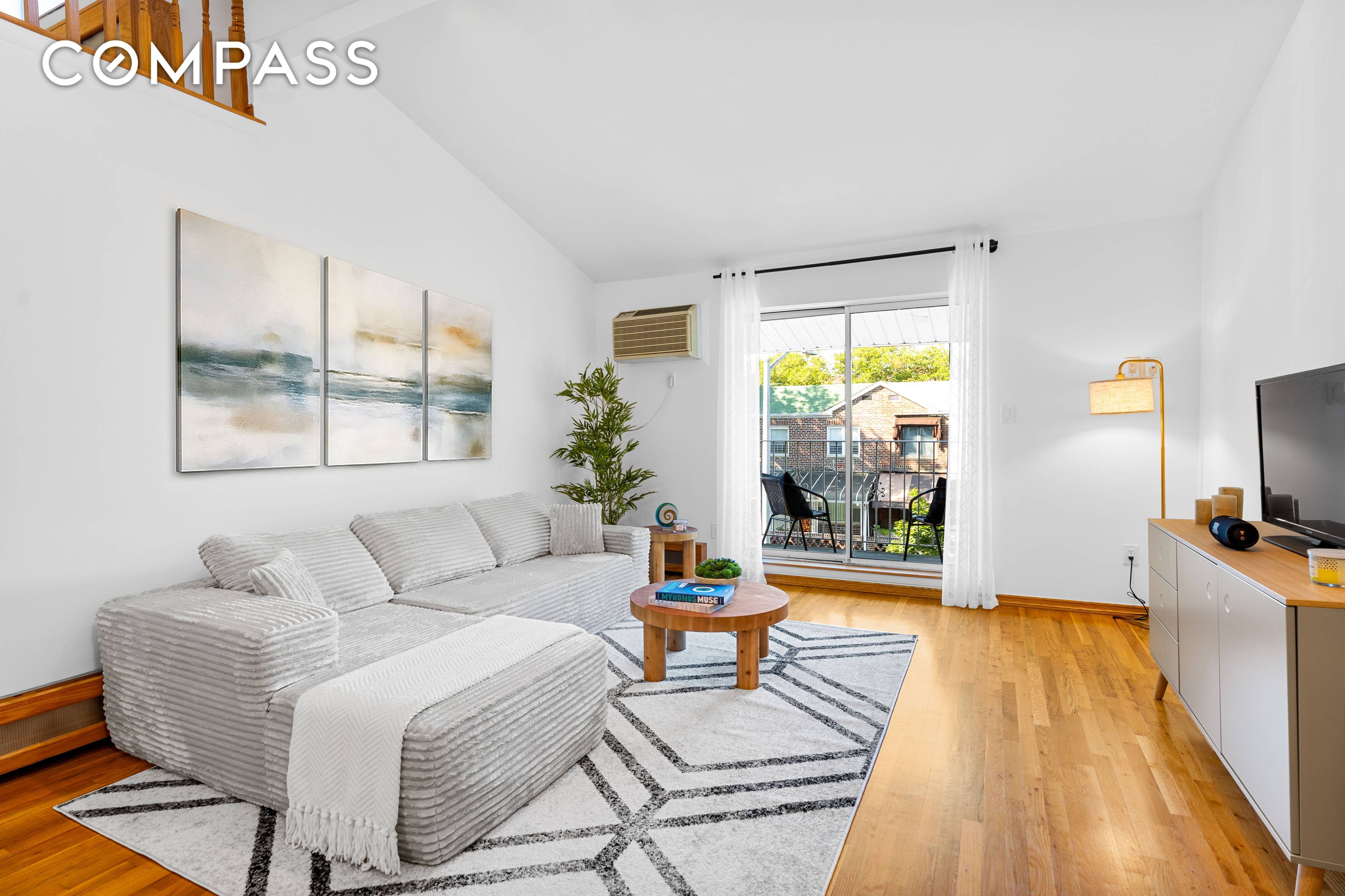Perched atop a quiet, boutique 15 unit condominium, this duplex is all about light, openness, and privacy.