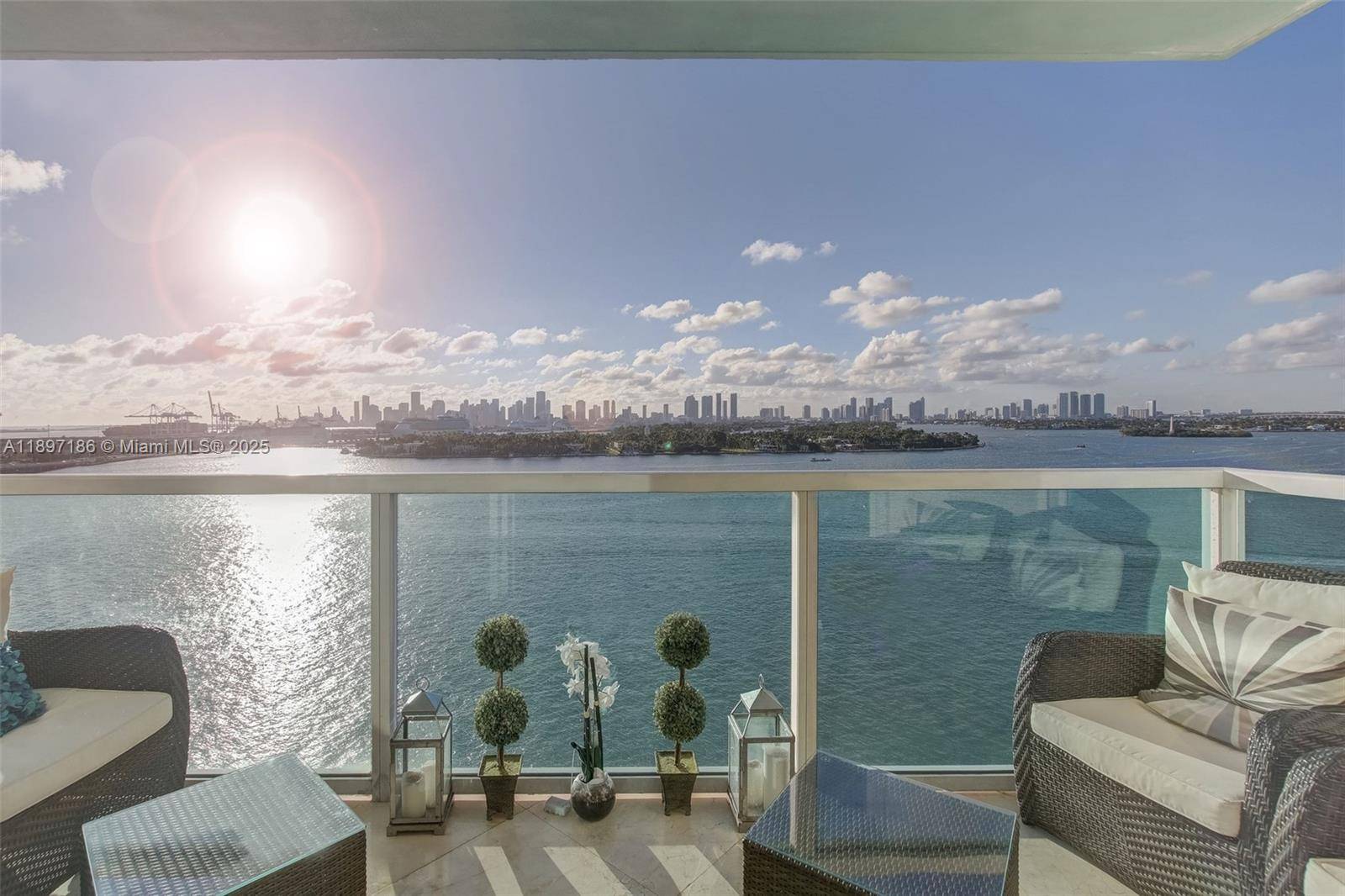 Spacious 3 bedroom residence at The Floridian featuring spectacular direct bay views and elegant marble flooring throughout.