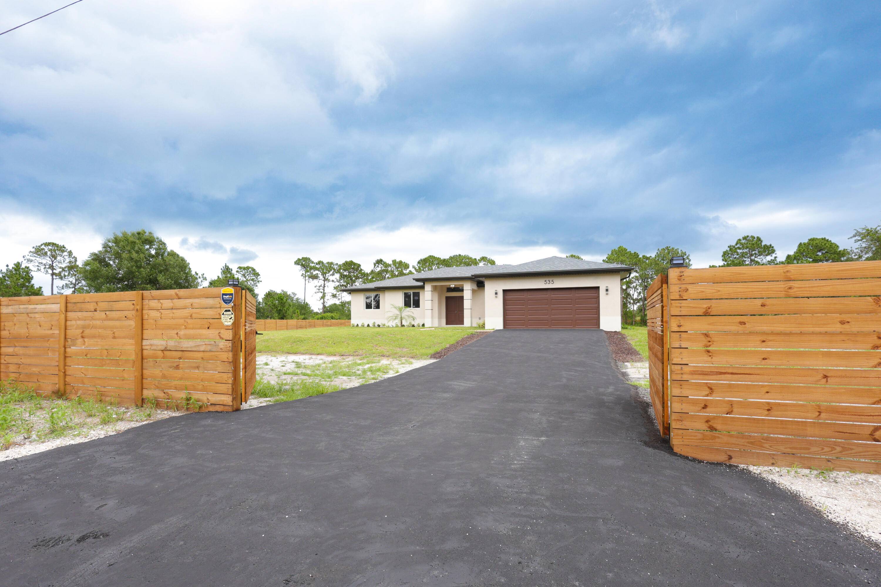 Discover this ONE OF A KIND NEW CONSTRUCTION HOME on a FULLY FENCED 1.