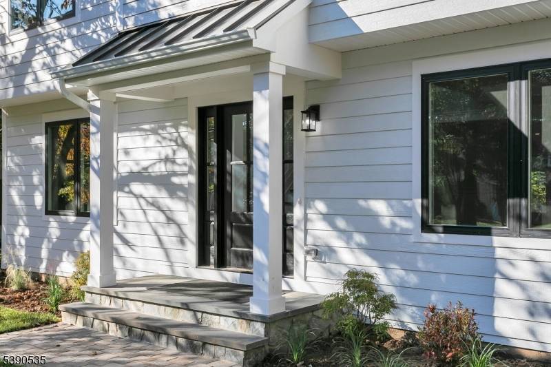 Welcome to this exquisitely renovated six bedroom home, where luxury meets functionality.