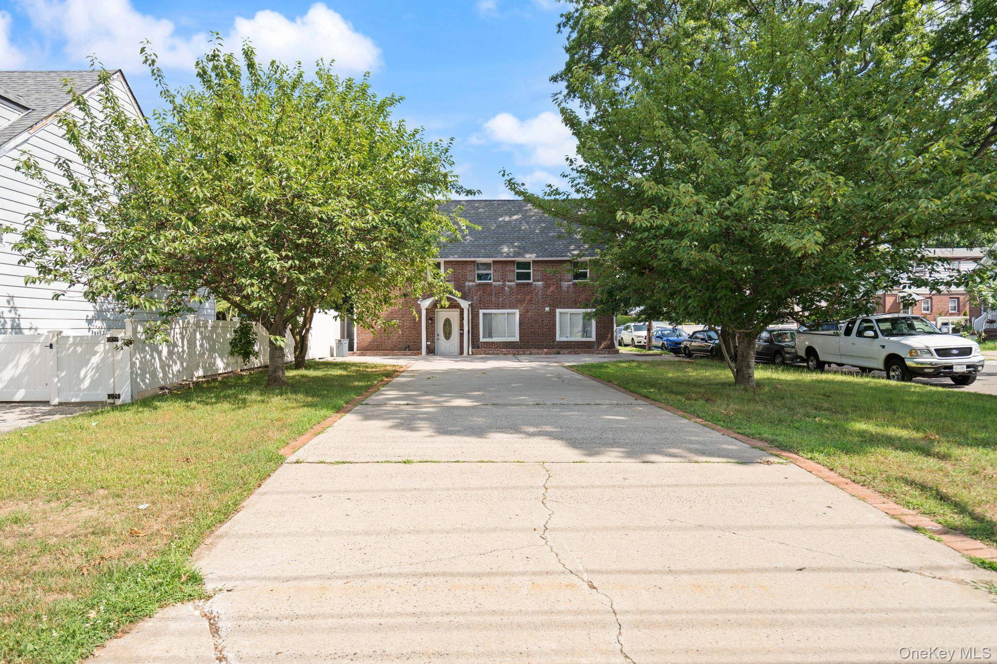 Welcome to this beautifully renovated Colonial style residence that seamlessly blends timeless charm with modern updates.