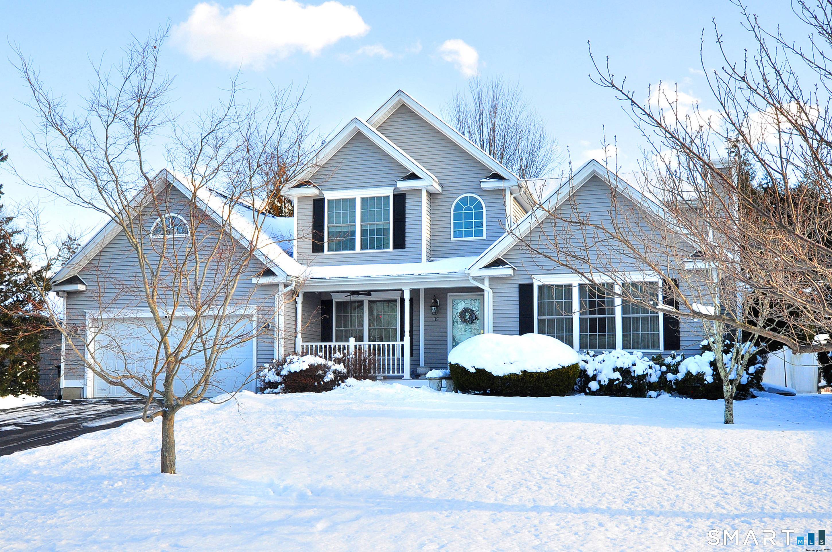 Rare find ! Spacious First Floor Primary Bedroom with walk in closet, full bath with large vanity, double sinks and walk in shower.