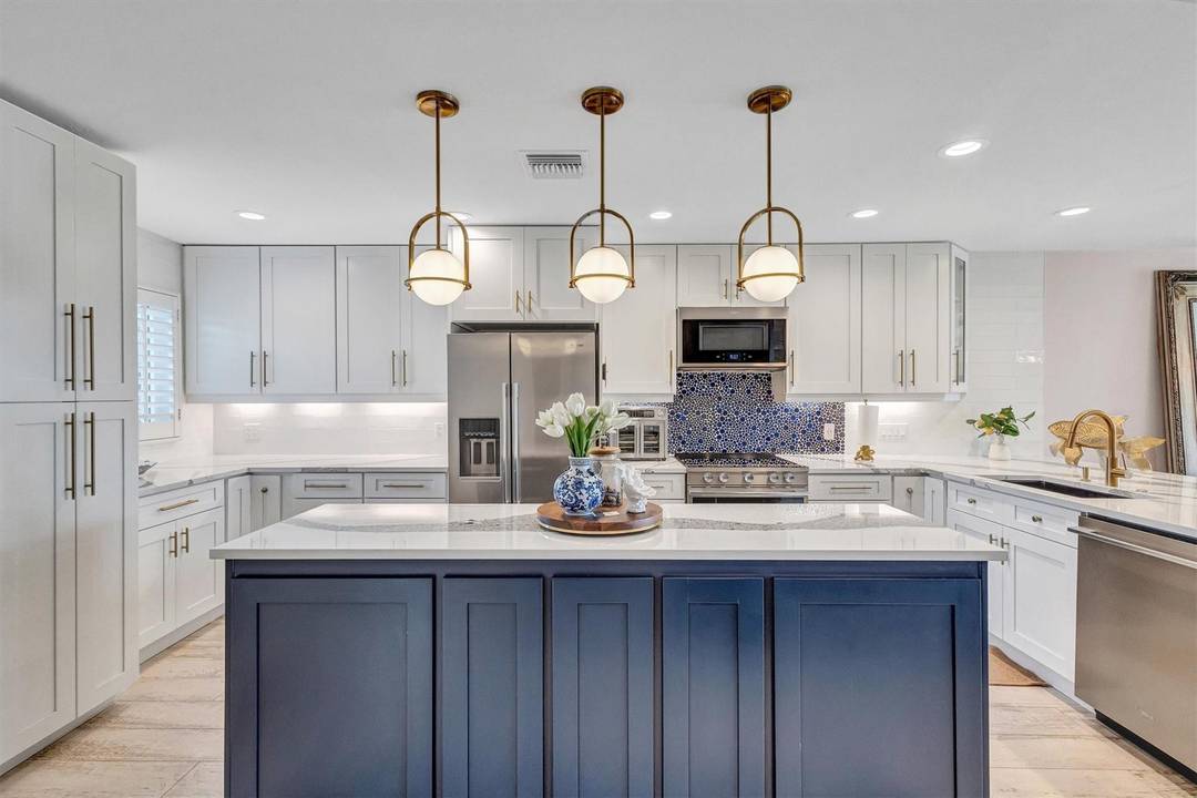 Experience coastal living at its finest in this beautifully remodeled beachfront condo !