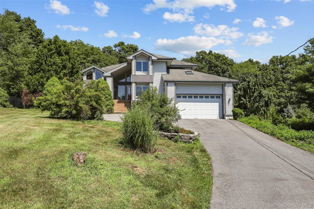 Welcome to 30 Eddy Road, a stunning contemporary residence nestled on a generous 1.