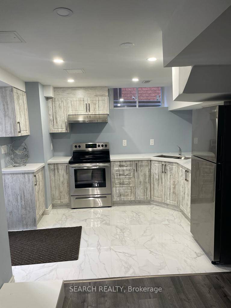 Beautifully finished 2 bedroom Legal basement apartment located in the prestigious Vales of Castlemore community.