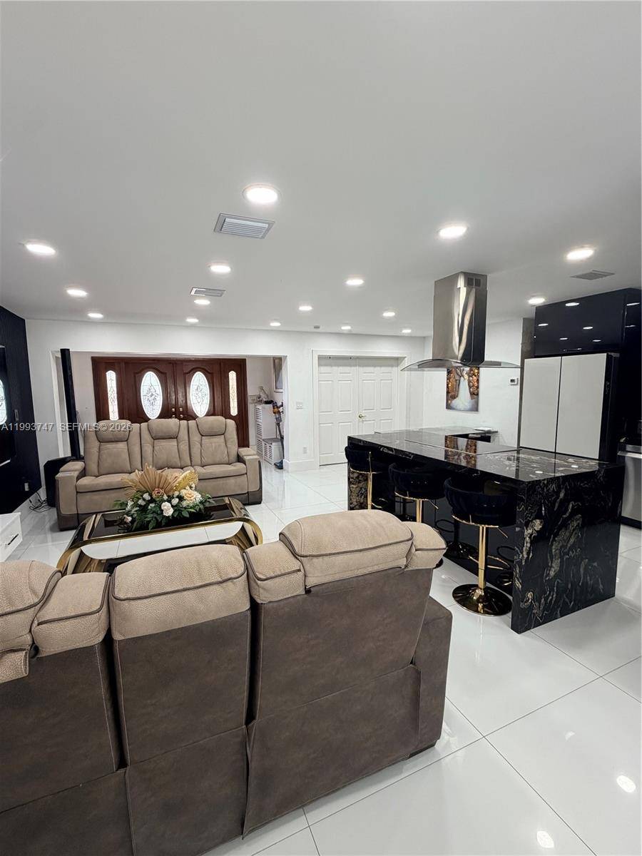 An exclusive property in the Hialeah area, featuring a corner lot and ample parking space.