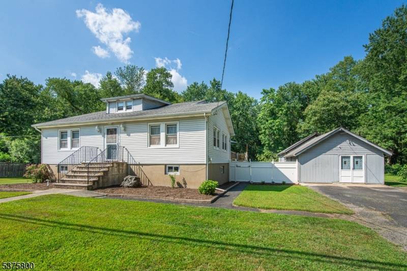 Extremely unique spacious 4 bedroom, 2, 196 sq ft cape cod home on a 1.