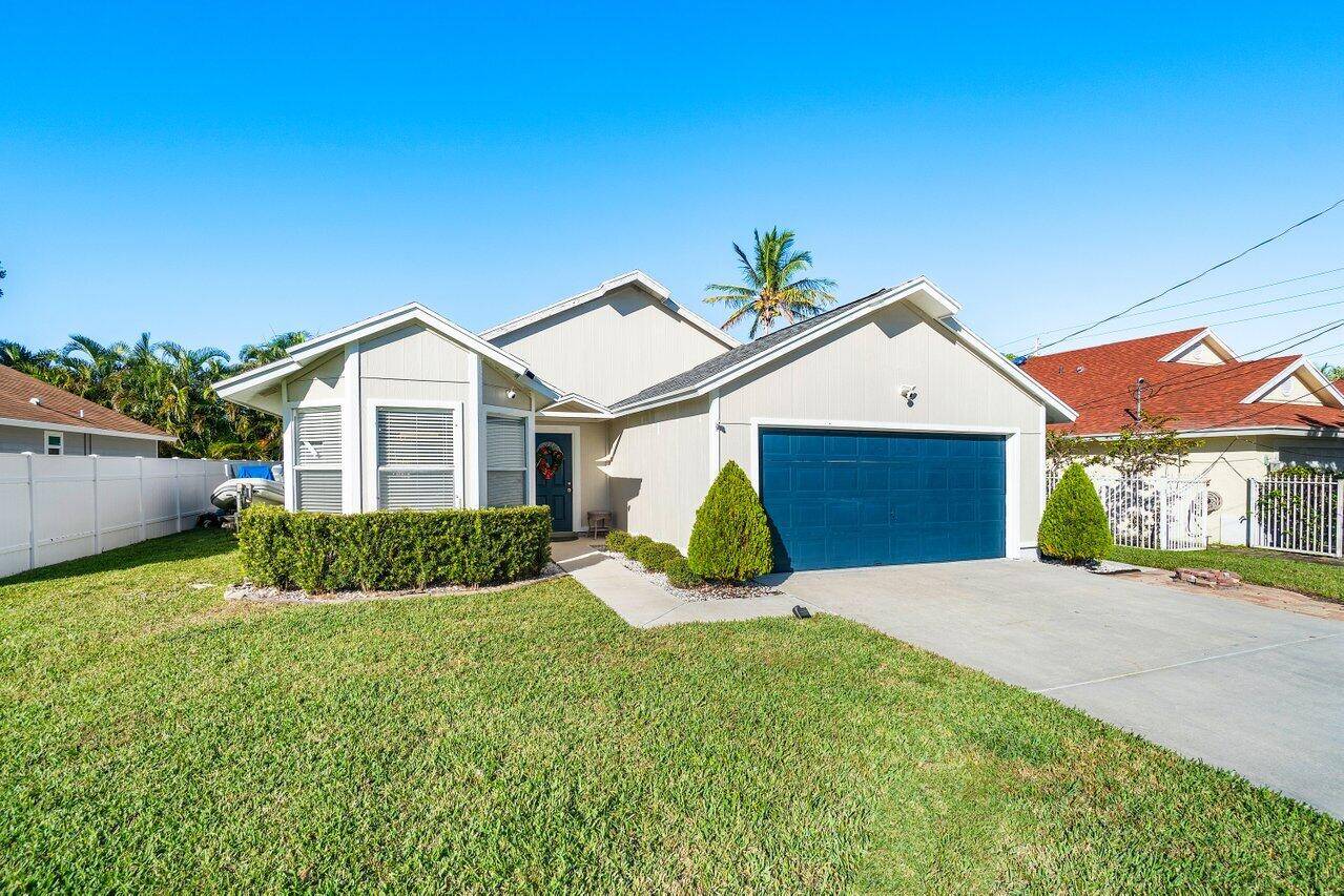 Don't miss the opportunity to own this beautifully renovated home in one of Jupiter's most sought after neighborhoods with NO HOA !