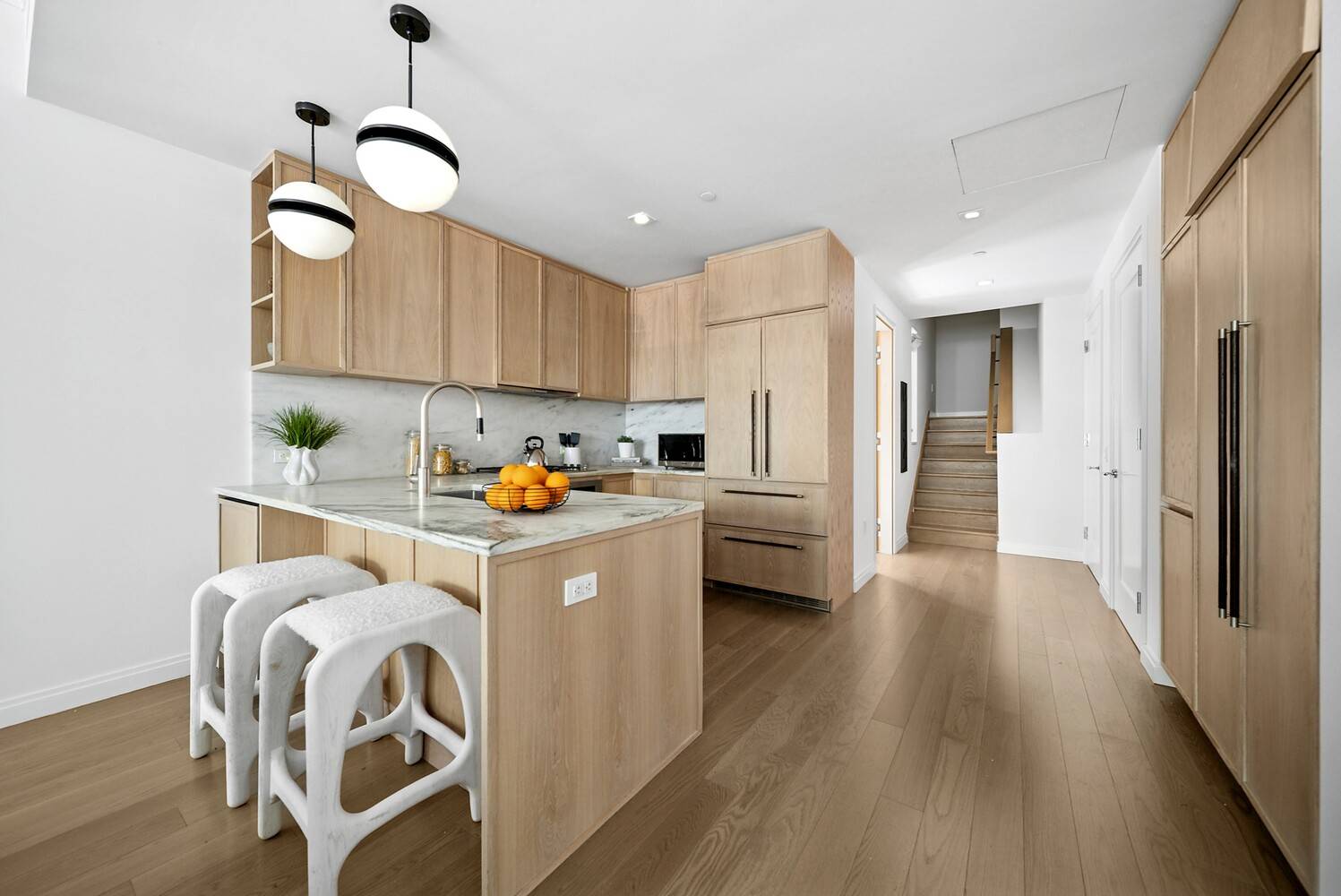 With 10' ceilings in the great room, one feels a sense of Edwardian grandeur throughout this oversized three bedroom duplex home.