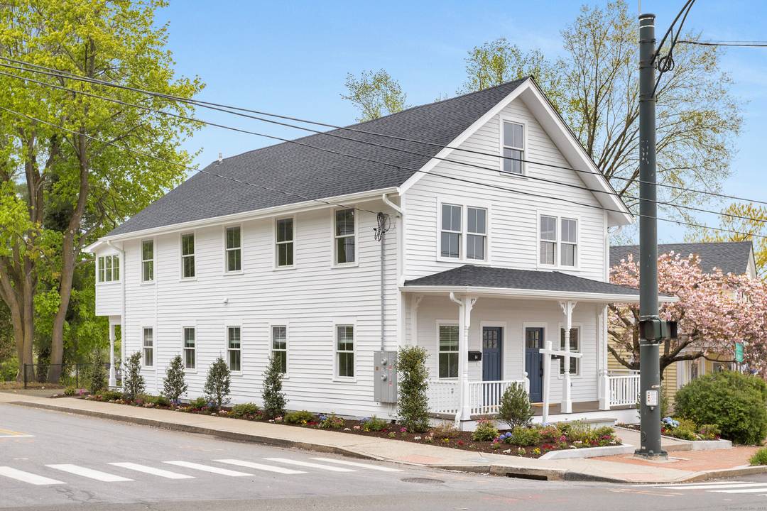 This bright and airy two bedroom duplex spans two levels and offers picturesque views of Main Street.