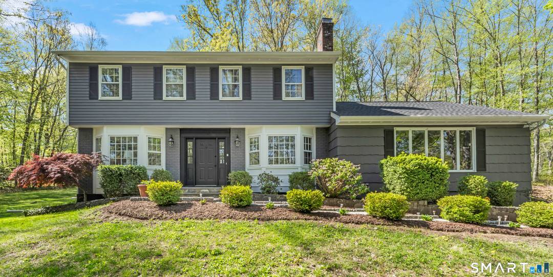 Nestled in one of Brookfield's most sought after neighborhoods, this spacious and beautifully maintained Colonial offers 4 bedrooms, 2.
