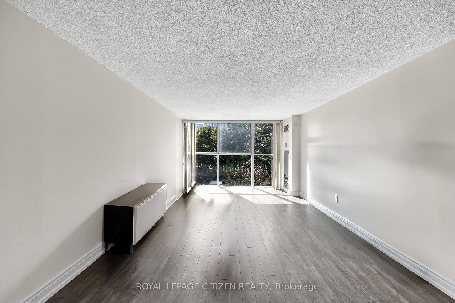 Spacious 2 bedroom, 2 bath condo in the heart of downtown Mississauga with open concept kitchen, stainless steel appliances, laminate floors, 7 inch baseboards, and floor to ceiling windows.