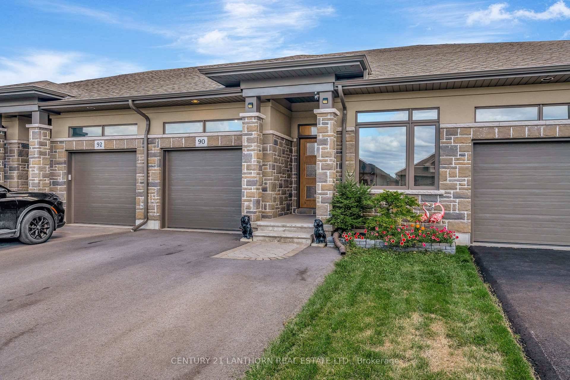 Welcome to 90 Covington. This townhome bungalow offers a very desirable layout.