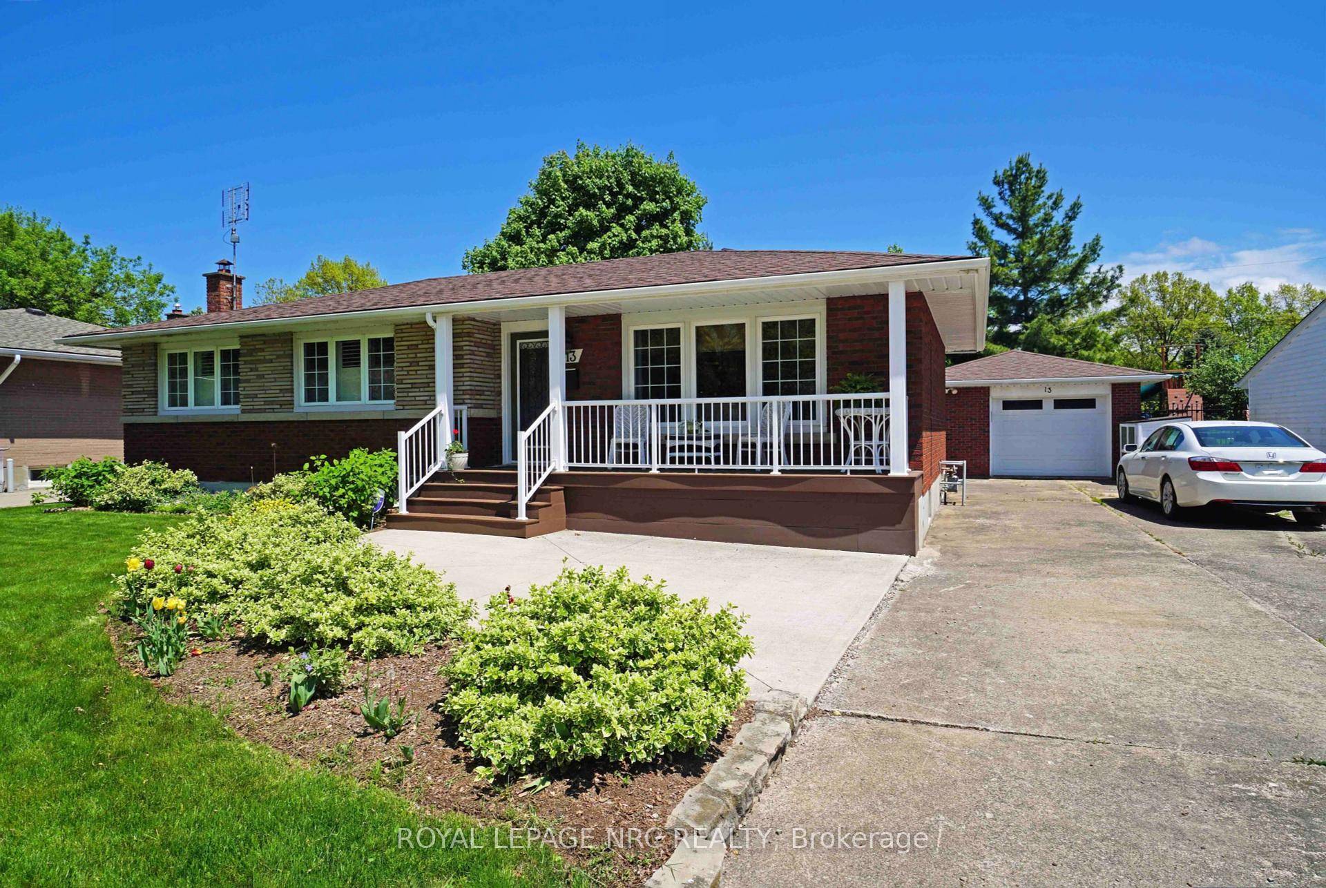 Spacious 1360 sq. ft. including sunroom bungalow with a finished basement featuring a second kitchen, rec room, bedroom, and bathroom perfect for entertaining, accommodating a larger family, or as an ...