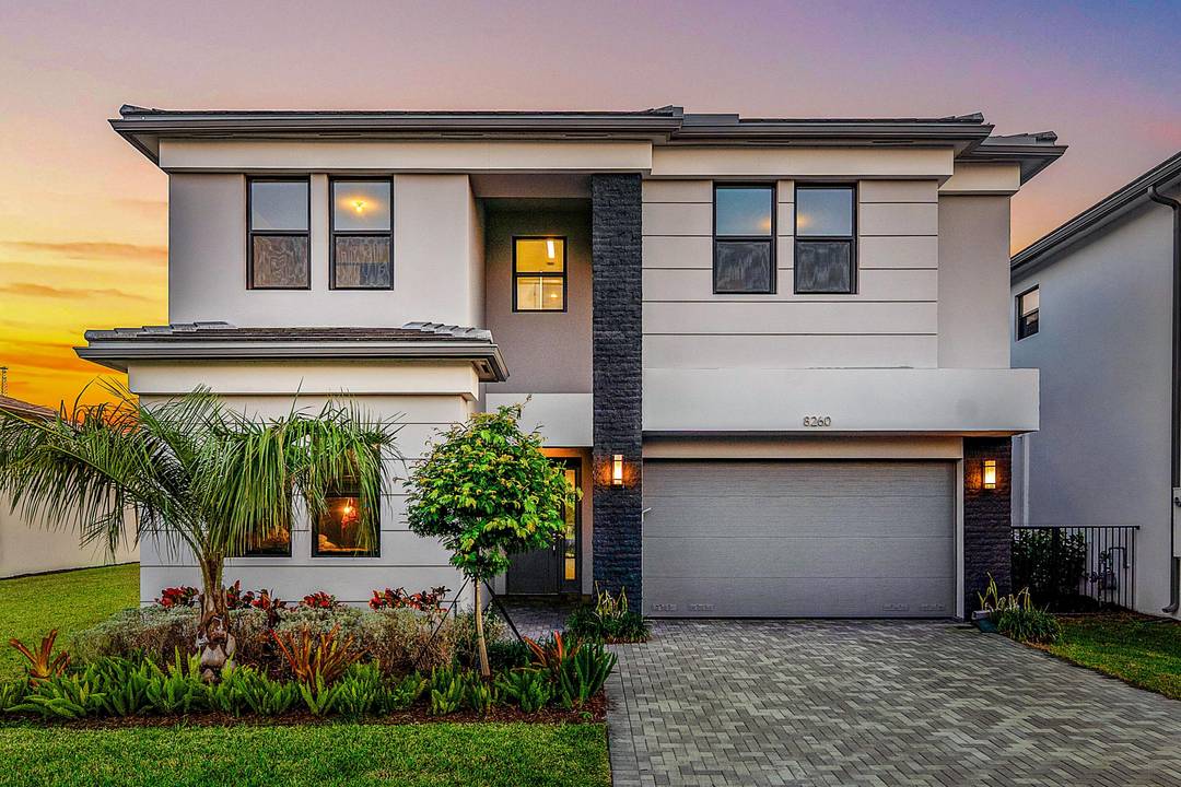 Pristine, barely lived in spacious family home on a quiet, secluded cul de sac in Lotus Palm of Boca Raton.