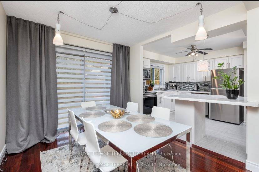 This charming and spacious townhome is nestled in a quiet, family friendly complex just steps from Lake Ontario.