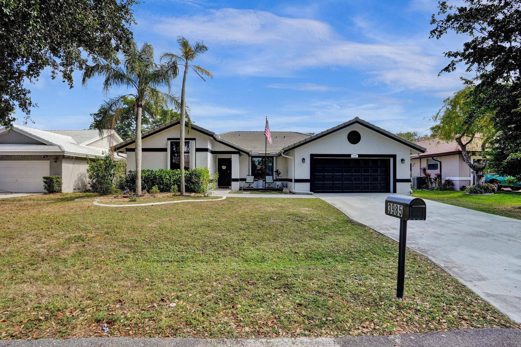 Beautifully renovated 4 bedroom, 2 bathroom home with 2 car garage in the highly desirable Crossings community of Coral Springs.