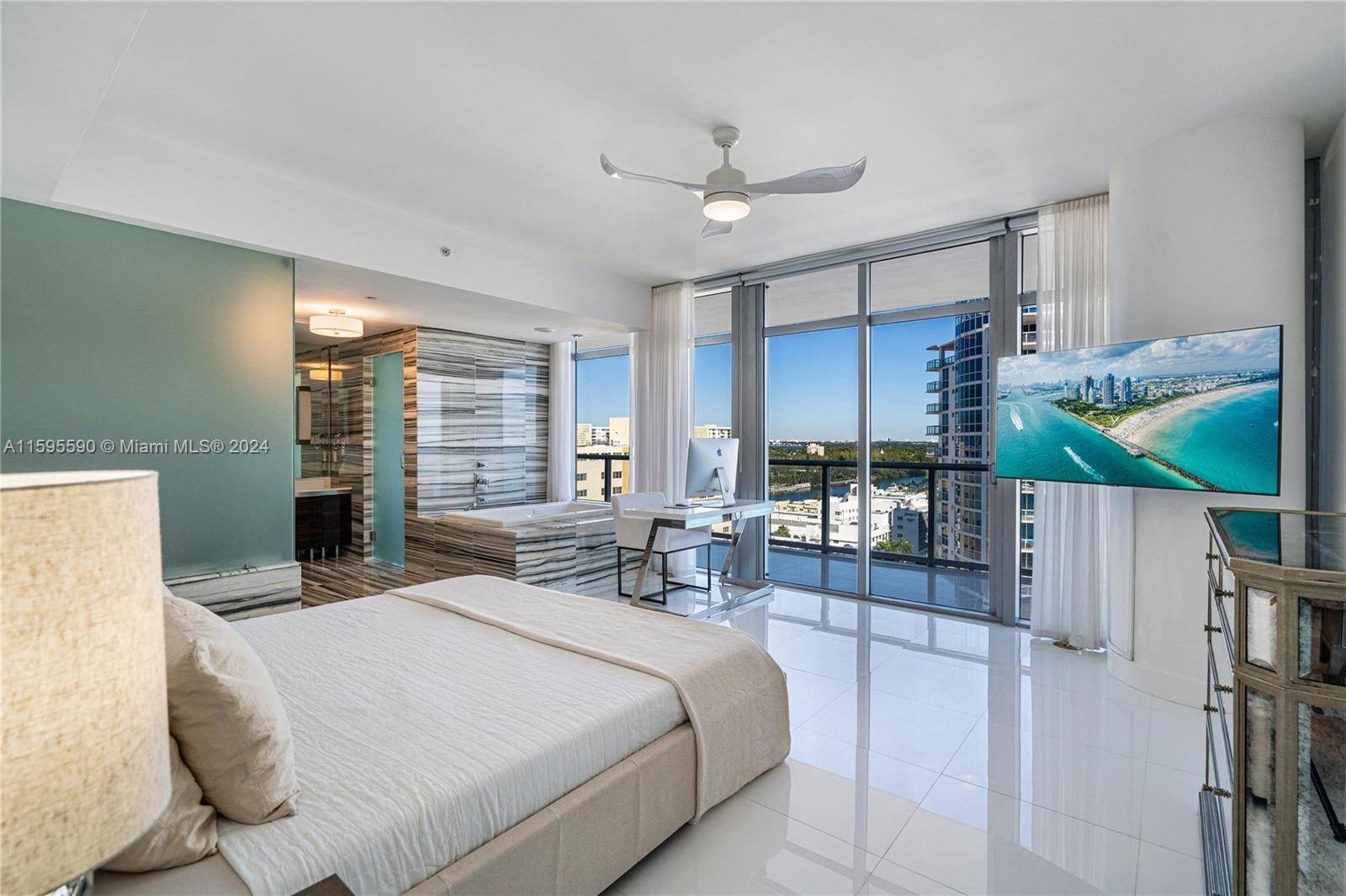 The Caribbean Residences honors its glitzy Art Deco past with historic architecture, original terrazzo floors, and decor reminiscent of the glamour of postwar Miami Beach.