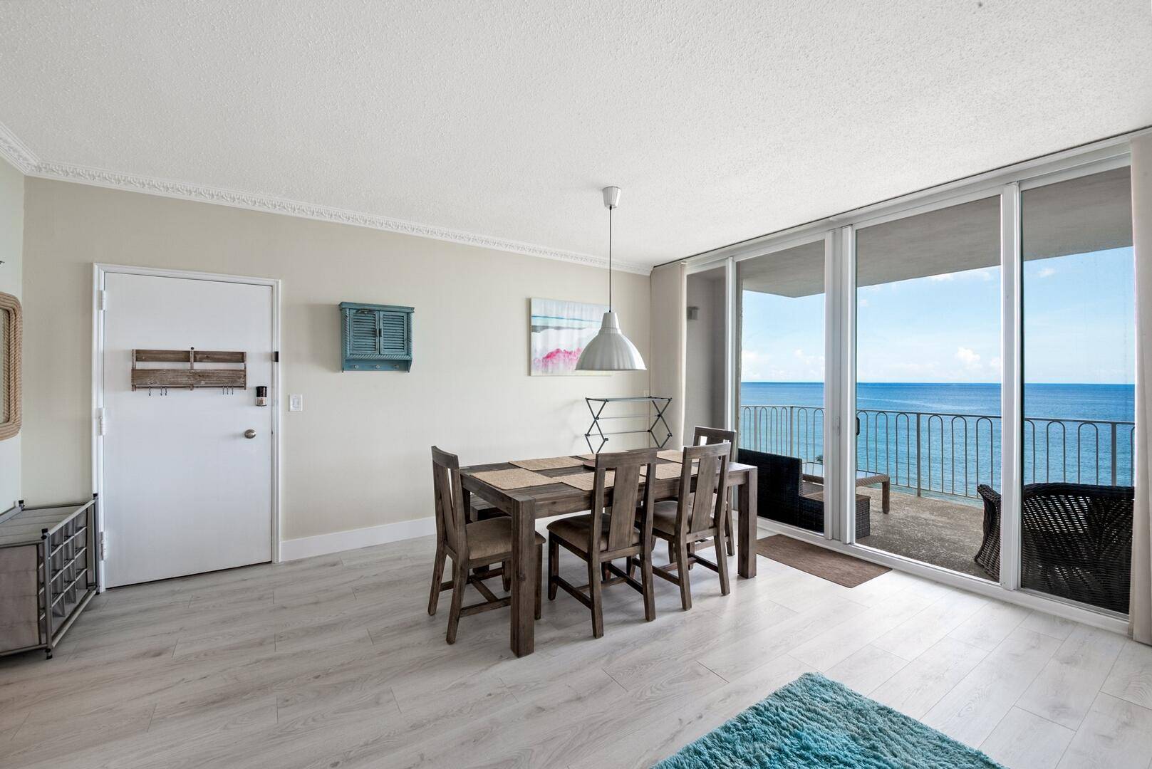Experience coastal living at its finest in this completely remodeled 2 bedroom, 2 bath penthouse at 3230 S Ocean Blvd.