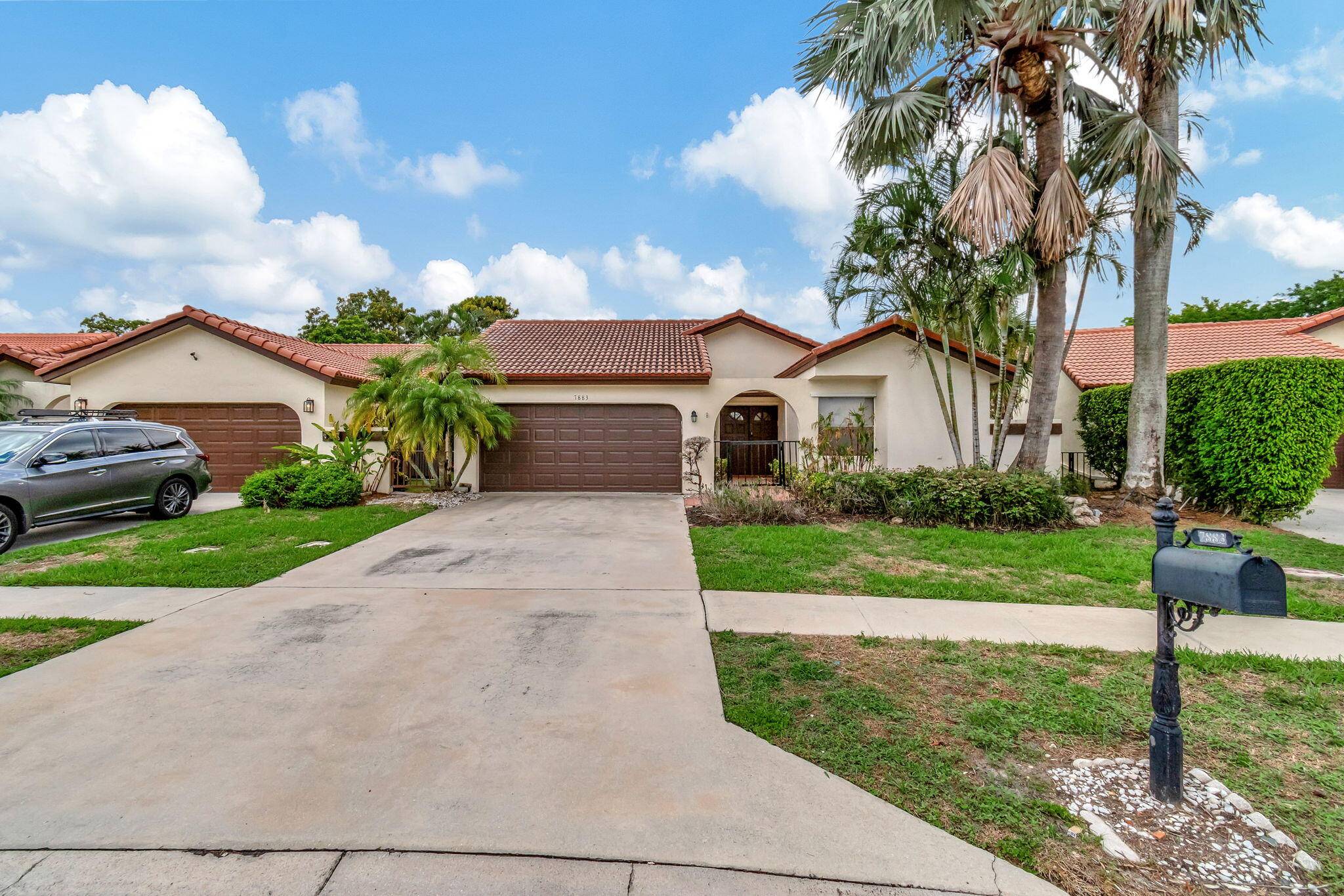 3 2 home in Central Boca with Private Saltwater Pool overlooking the lake, with fenced in yard.