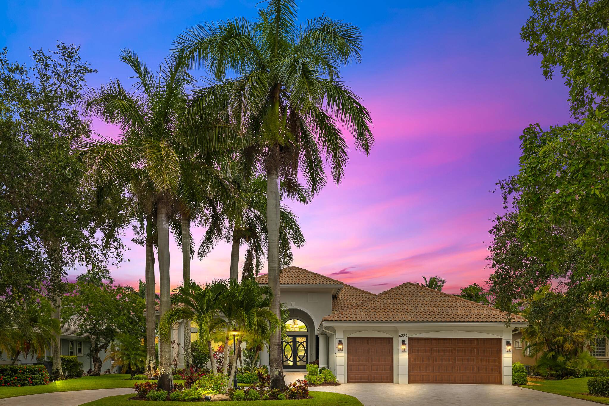 Set on a prime waterfront lot with sweeping lake and preserve views, this fully reimagined Heron Bay estate is the crown jewel of The Falls.